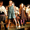 Urinetown : Urinetown: The Musical is an award-winning satirical comedy musical that pokes fun at capitalism, socialism, bureaucracy, corporate mismanagement, and petty small town politics. Urinetown rejects musical theatre convention, parodying successful Broadway shows such as Les Misérables, Evita, Annie and West Side Story, and even satirizes its own significance. In reverse pantomime style, the unconventional plotline shatters audience expectations of a pleasant ending. Famous songs from the show include "Don't Be the Bunny" and "Run, Freedom, Run!"

The show was directed by Tony Award winner John Rando, and features music and lyrics by Mark Hollmann and book and lyrics by Greg Kotis. It debuted at the New York International Fringe Festival, was produced Off-Broadway at the American Theatre for Actors and then moved to Broadway, opening at Henry Miller's Theatre on September 20, 2001 (its planned opening having been postponed after the September 11, 2001 attacks). It ran on Broadway through January 18, 2004, closing with a total of 25 previews and 965 performances.